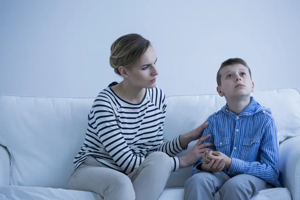 Autistic Boy And Her Mother 