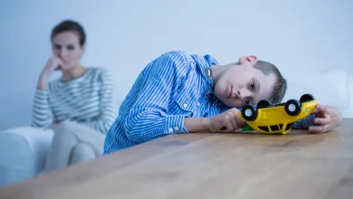 What is Regressive Autism? Kid Playing On A Toy Car