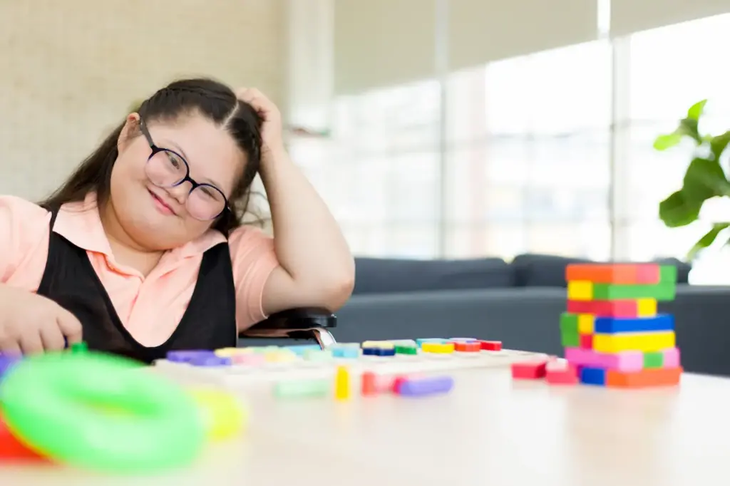 Child with Autism Playing on the Table 